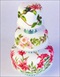 A 3-Tier Wedding Cake, with various painted flowers on each tier