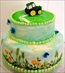 Wedding Cake with painted field flowers and an icing tractor